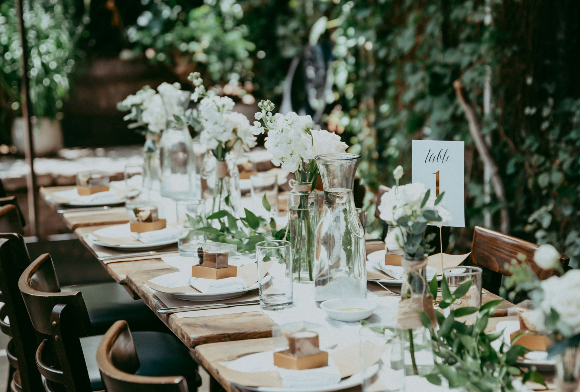 Luxury outdoor wedding reception table setup with floral styling